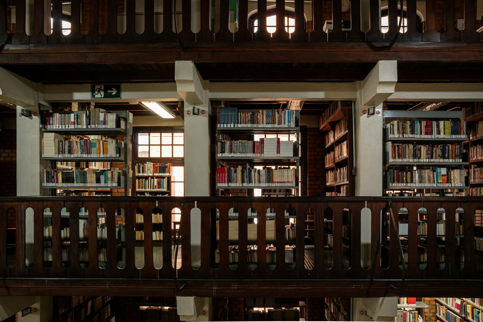 A cozy library interior with wooden bookshelves